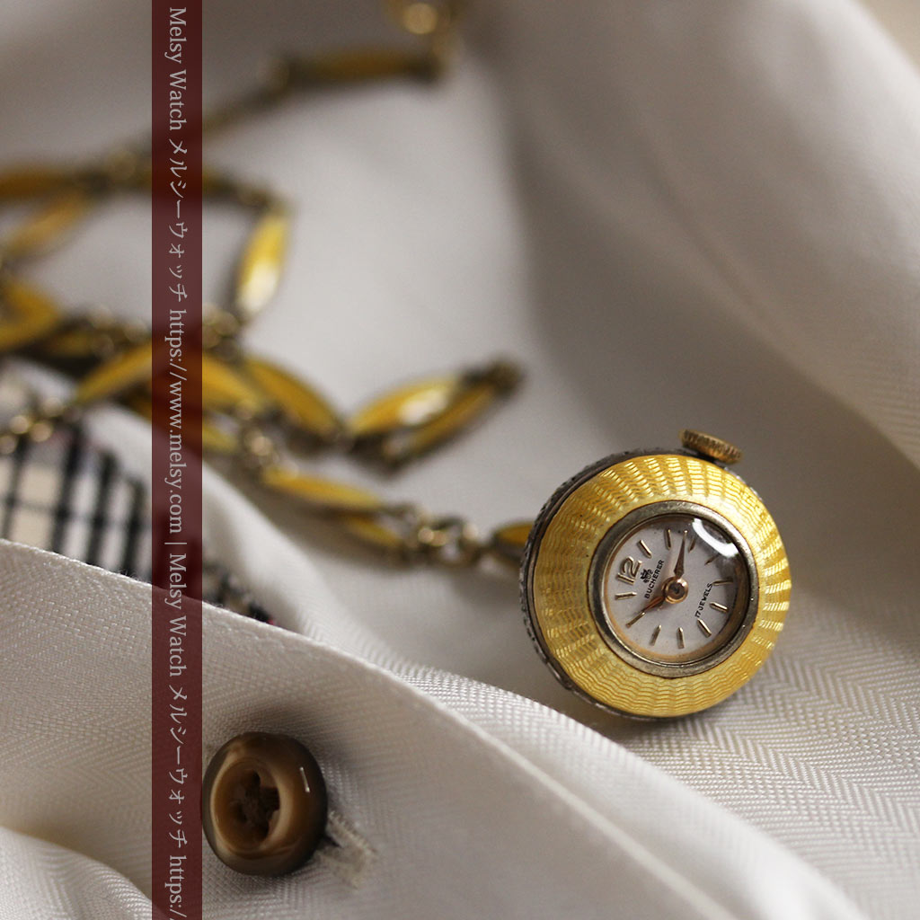 ブヘラの銀無垢ネックレス時計 梔子色のエナメル装飾【1960年頃】