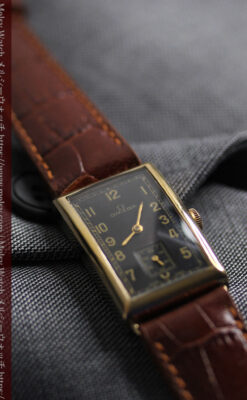 オメガのシックな黒色文字盤 品ある縦長アンティーク腕時計 【1940年製】-W1529-20