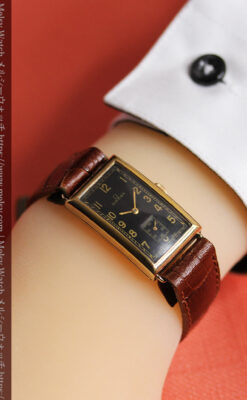 オメガのシックな黒色文字盤 品ある縦長アンティーク腕時計 【1940年製】-W1529-31