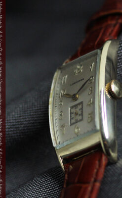 緩やかな曲線が上品な細長いケースのロンジンのアンティーク腕時計【1946年頃】-W1616-17